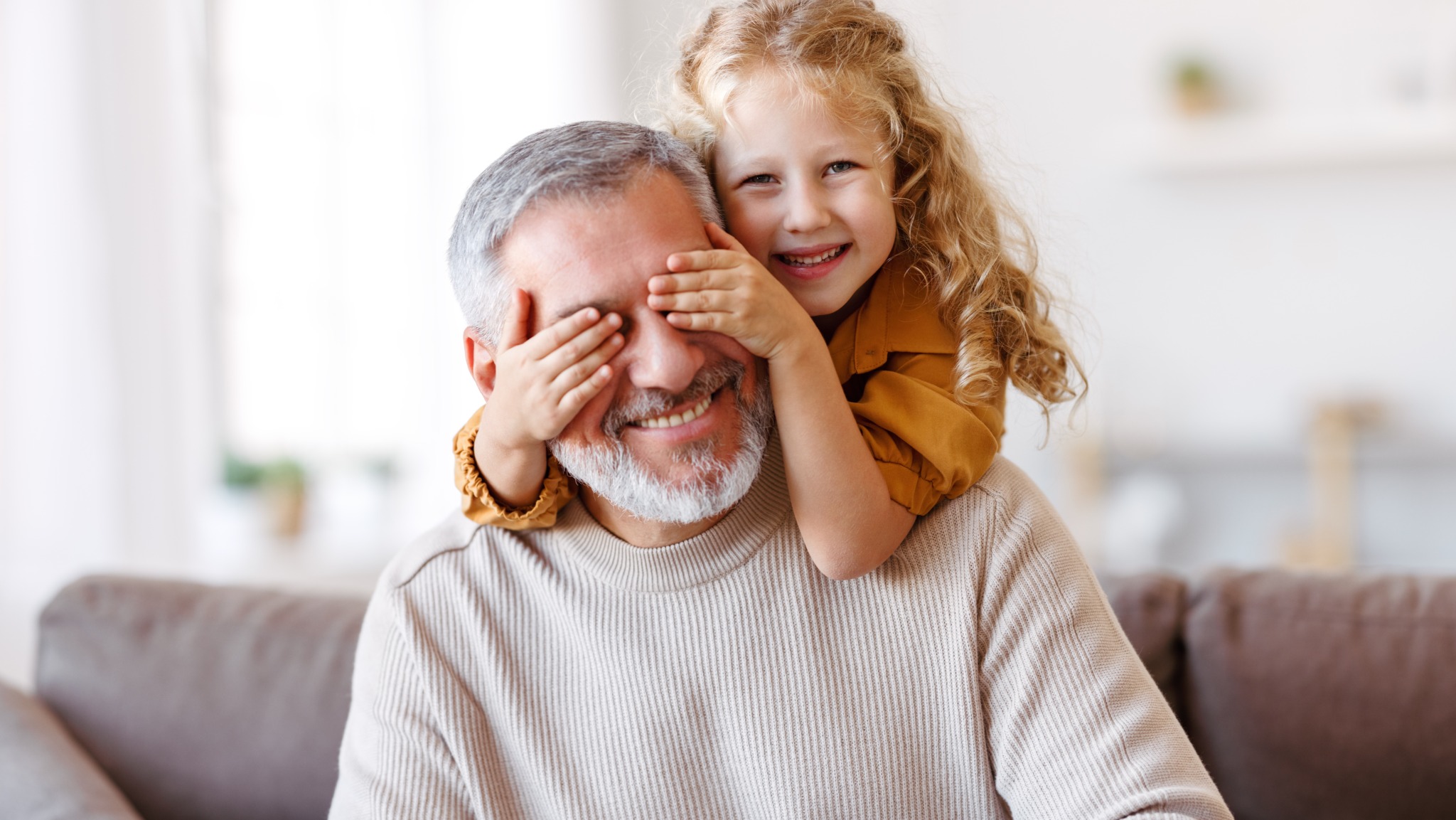 Cute,Little,Girl,Covering,Eyes,With,Hands,Of,Her,Smiling