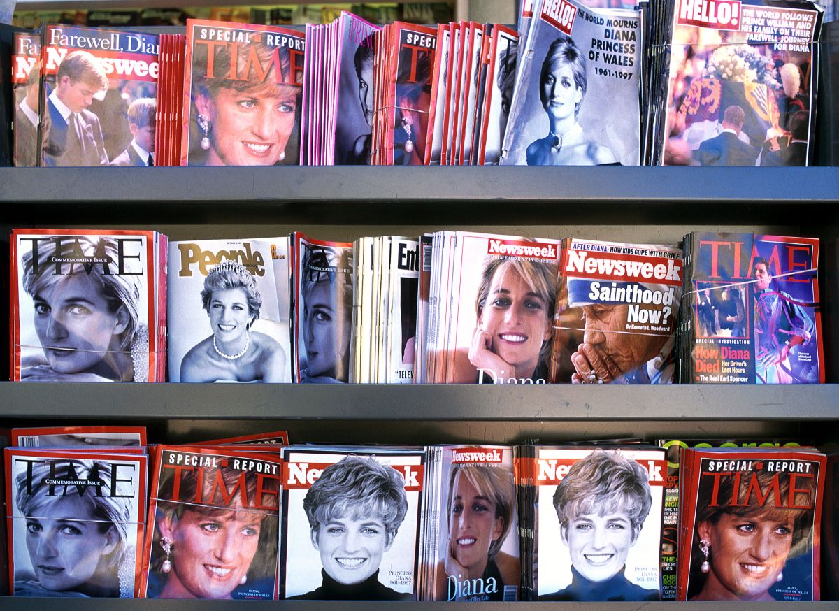 A magazine rack display featuring Princess Diana