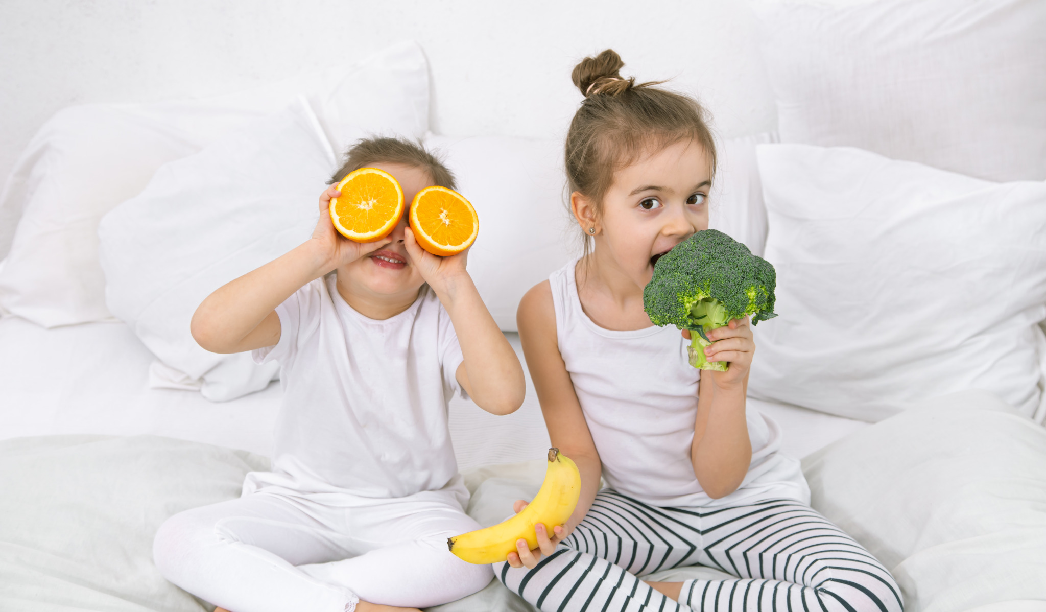 happy-two-cute-children-playing-with-fruits-vegetables