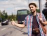 hitchhiker-catches-car-man-travels-with-camera