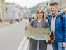 smiling-young-couple-with-map