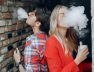 stylish-young-couple-with-vape-city