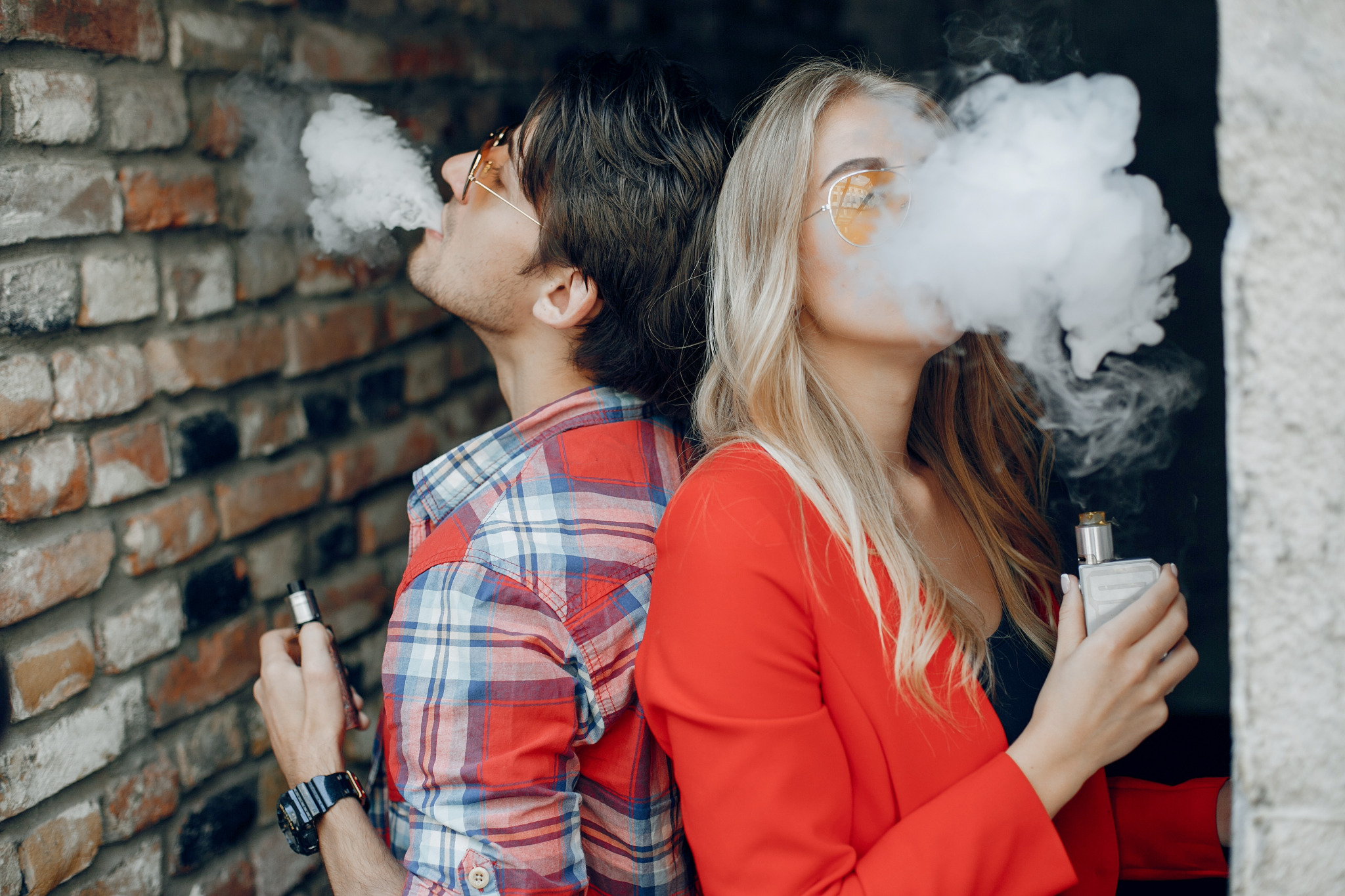 stylish-young-couple-with-vape-city